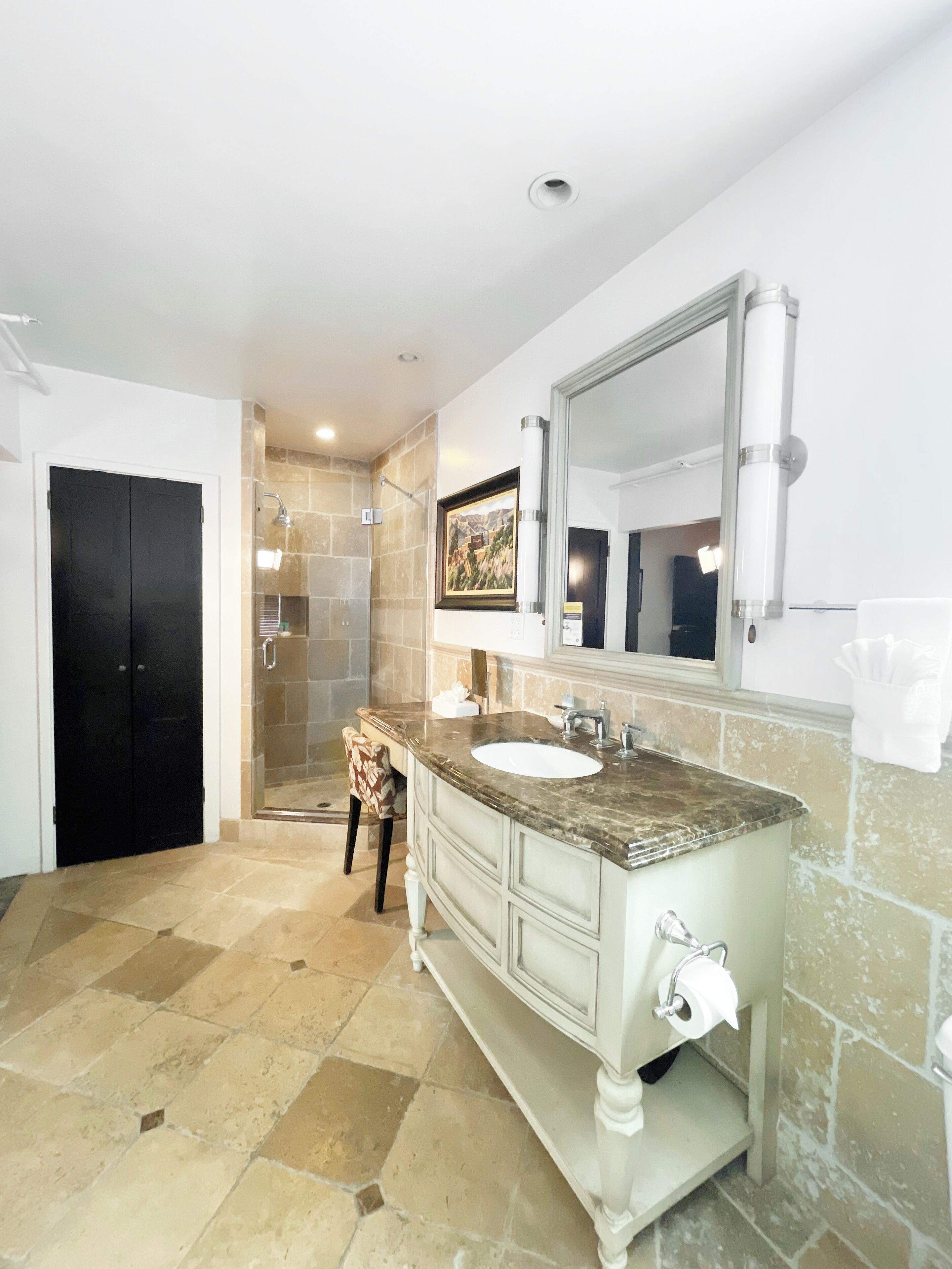 room, 1 king bed with sofa bed, courtyard view | bathroom | hair dryer, towels, soap, shampoo