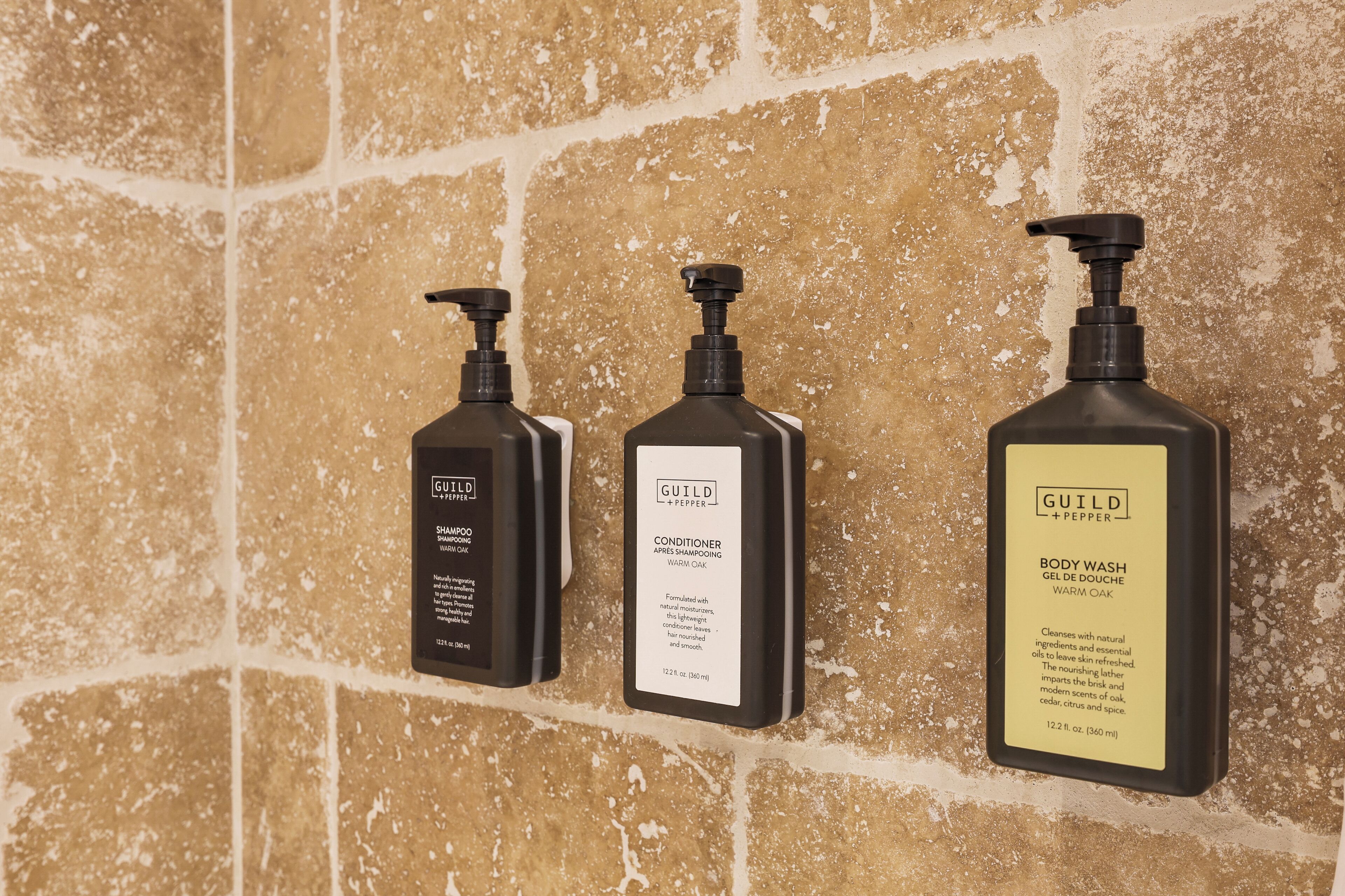 room, 1 king bed | bathroom | hair dryer, towels, soap, shampoo