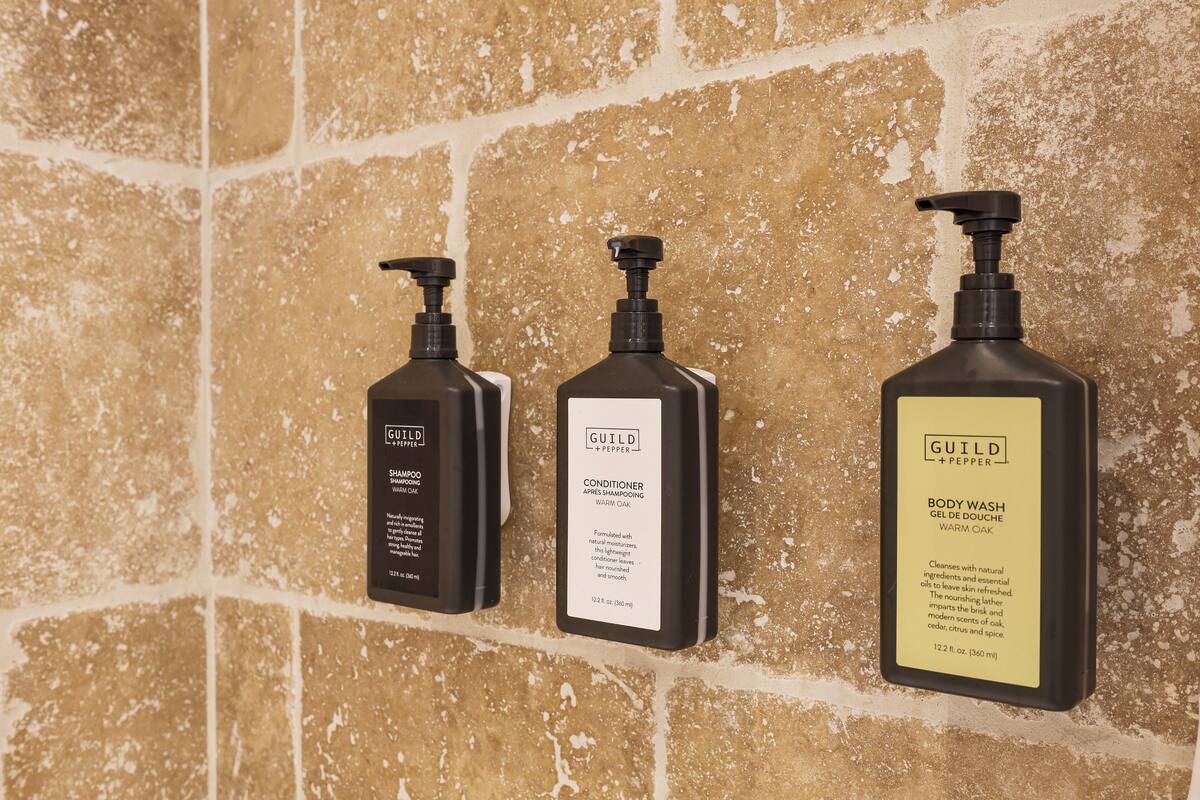 room, 1 king bed | bathroom | hair dryer, towels, soap, shampoo