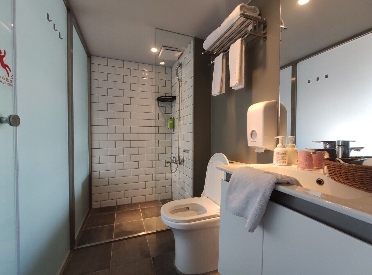 superior double room | bathroom | shower, rainfall showerhead, free toiletries, hair dryer