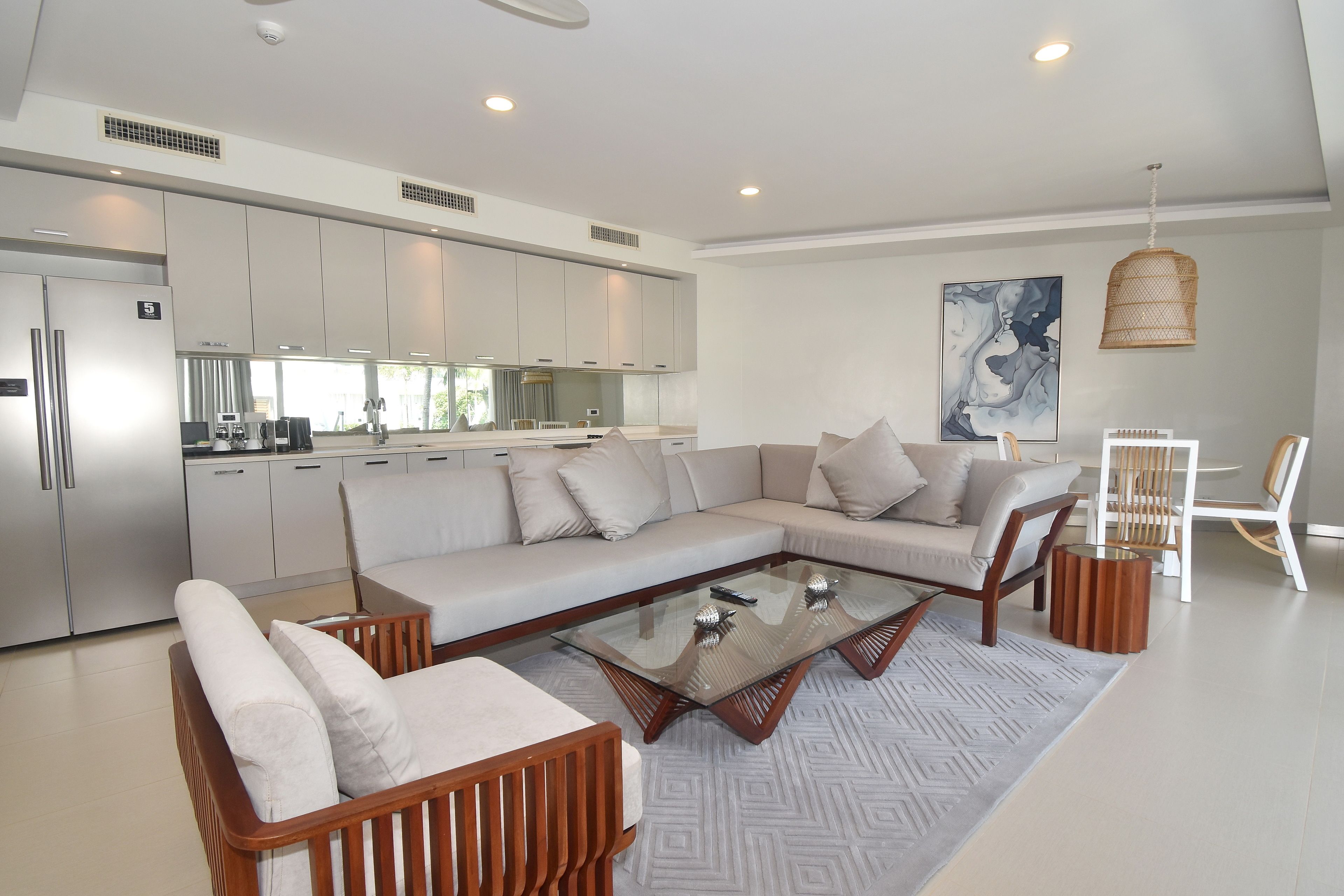 premier suite (three bedroom sea view) | living room | 43-inch flat-screen tv with cable channels, tv