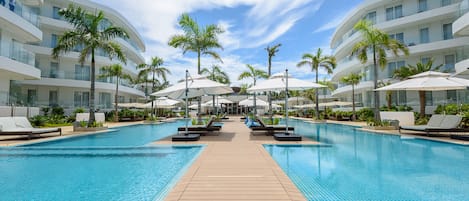 2 outdoor pools, open 7:00 AM to 9:00 PM, free cabanas, sun loungers