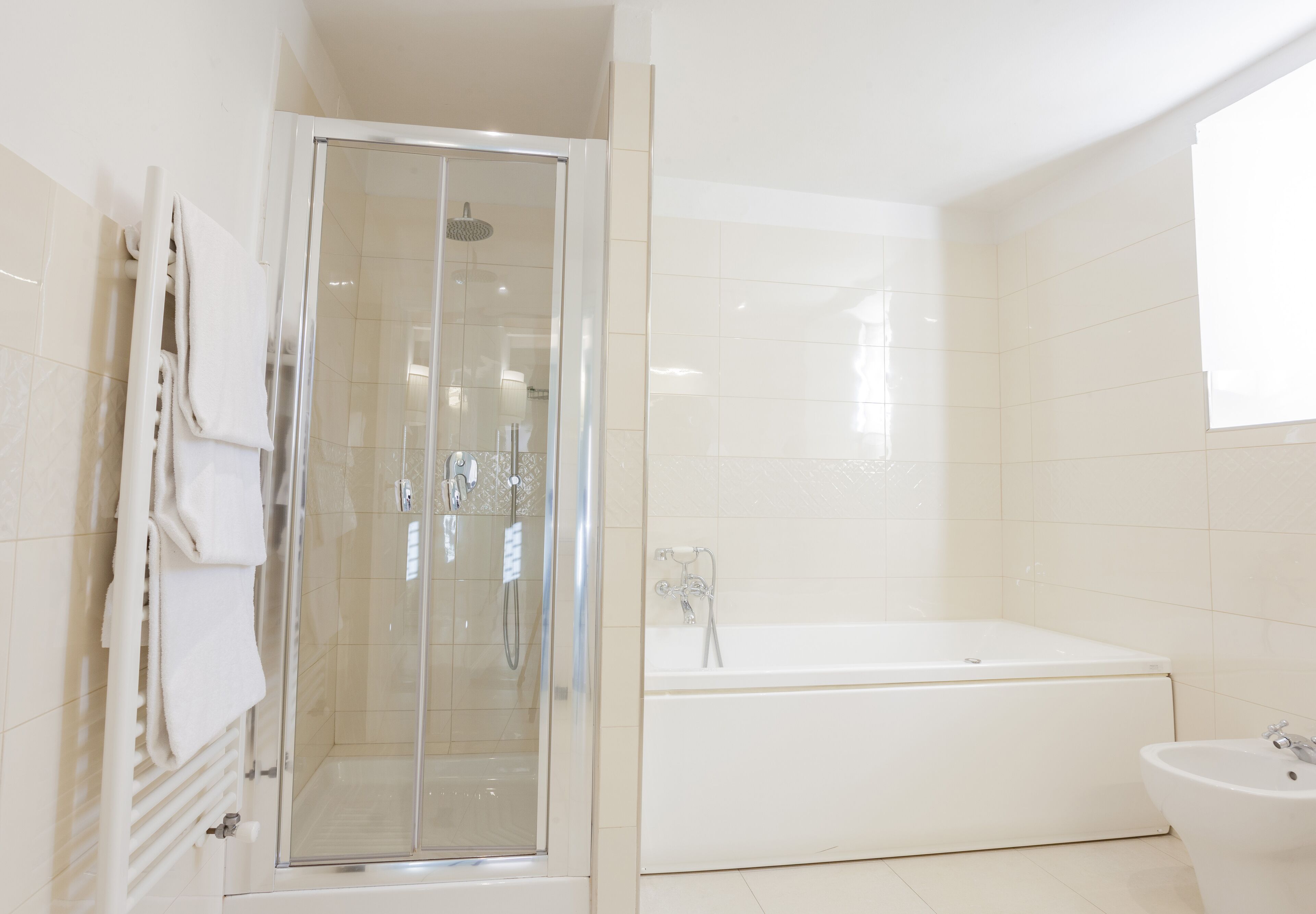 family quadruple room | bathroom | shower, rainfall showerhead, free toiletries, hair dryer