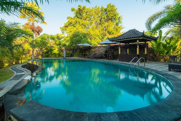 Outdoor pool, open 8:00 AM to 9:00 PM, pool umbrellas, pool loungers