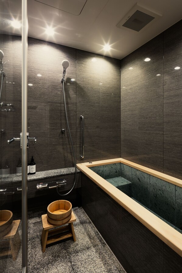 Luxury Suite, Multiple Beds, City View | Bathroom | Combined shower/bathtub, deep-soaking bathtub, free toiletries