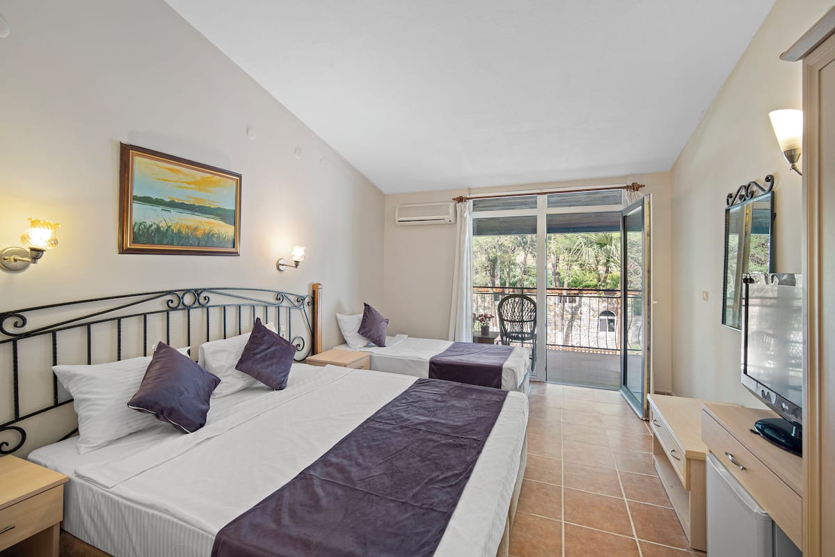 Biancheria da letto di alta qualità, minibar, insonorizzazione