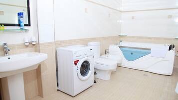 Apartment | Bathroom | Free toiletries, hair dryer, slippers, towels