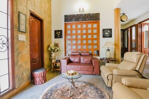 Lobby sitting area - OYO 18606 Home@b74 (Noida)