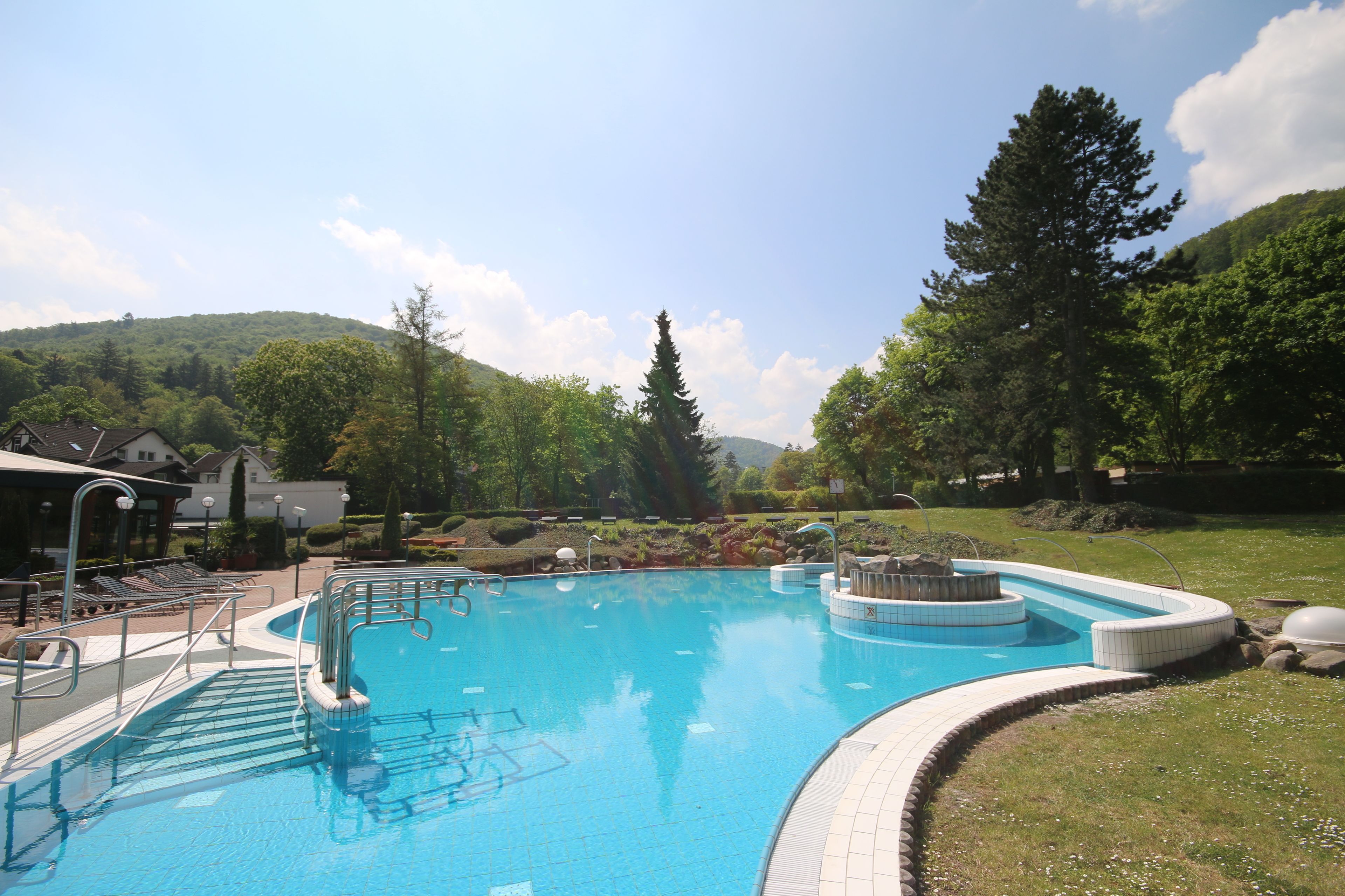indoor pool, 2 outdoor pools, open 9:00 am to 8:00 pm, pool umbrellas