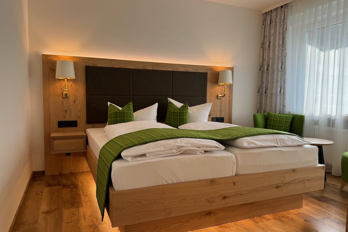 deluxe double room | premium bedding, minibar, in-room safe, individually furnished