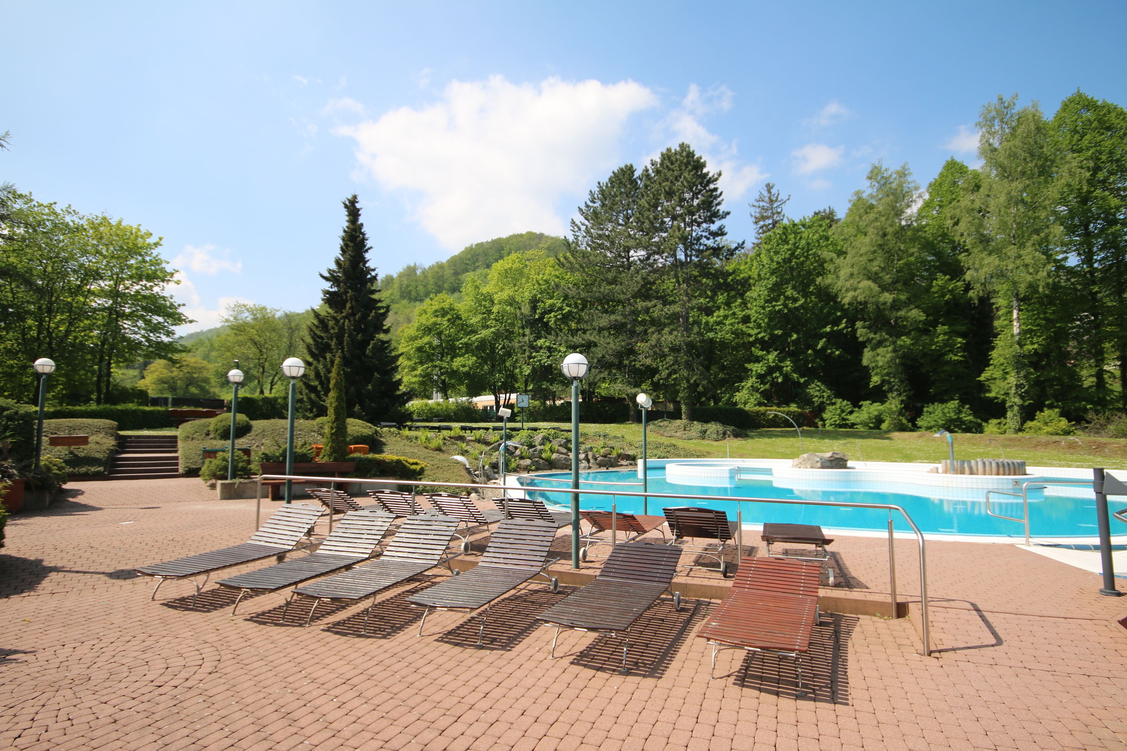 indoor pool, 2 outdoor pools, open 9:00 am to 8:00 pm, pool umbrellas