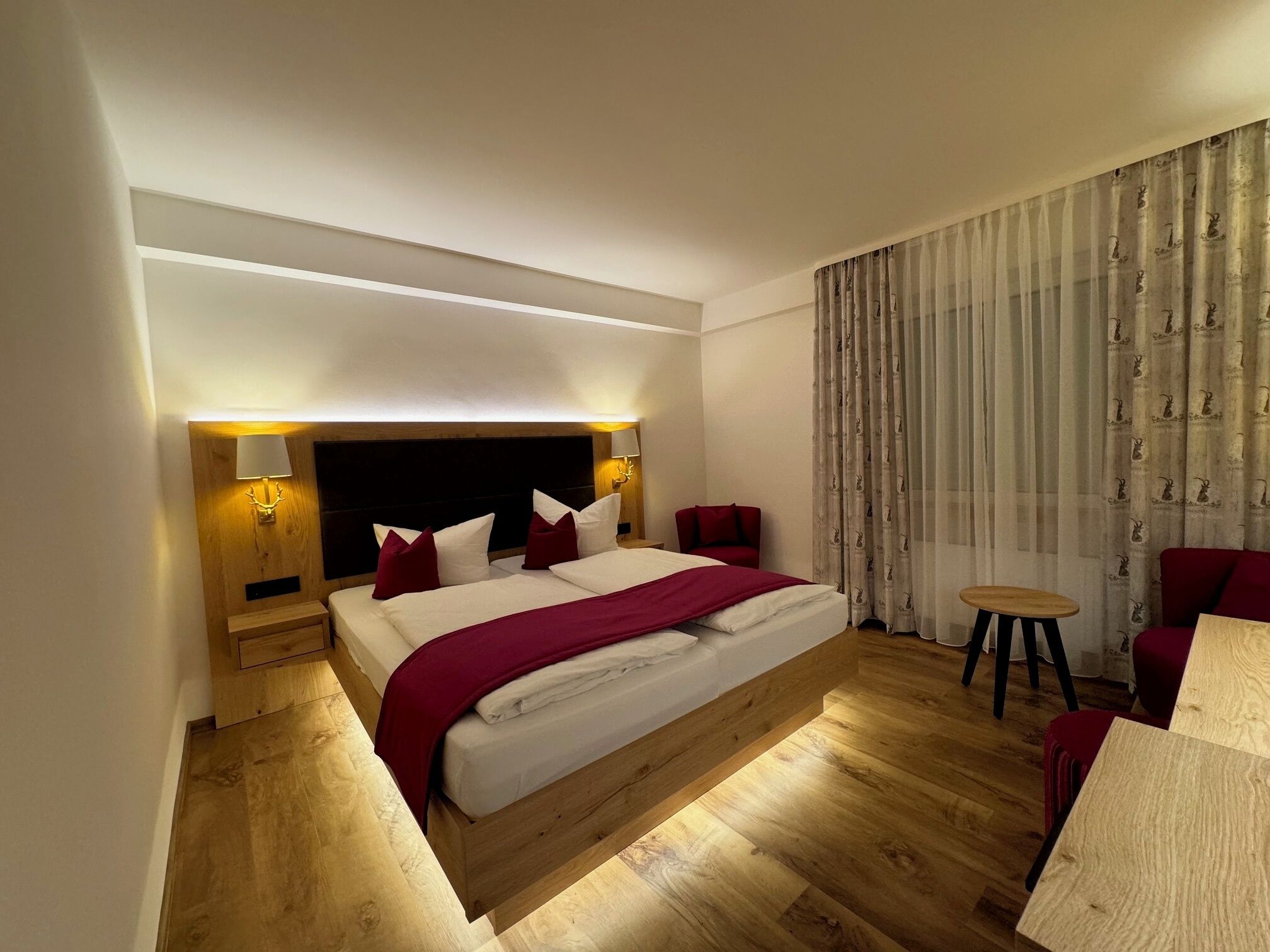 deluxe double room | premium bedding, minibar, in-room safe, individually furnished