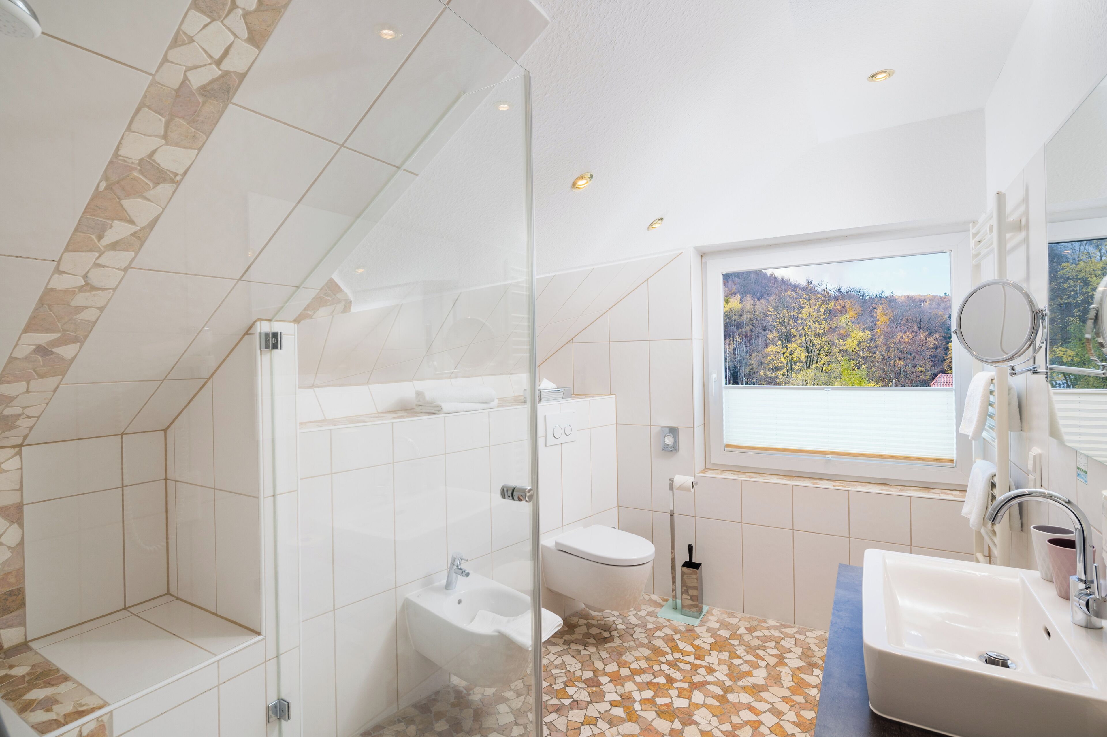 junior suite | bathroom | shower, hair dryer, towels