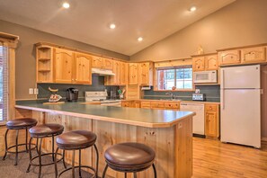 Fridge, microwave, stovetop, dishwasher - Bright & Cozy Duck Creek Cabin w/ Grill & Fire Pit (Duck Creek Village)