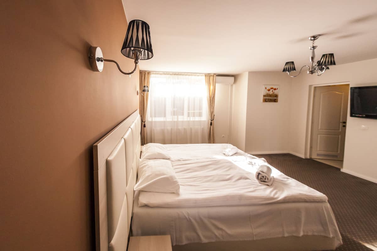 Desk, blackout drapes, rollaway beds (surcharge), WiFi (free)