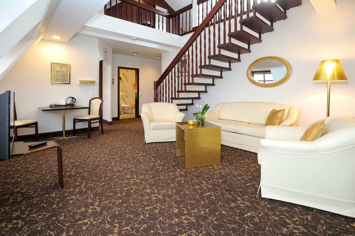 Phòng Suite Presidential | Bộ đồ giường kháng dị ứng, minibar, bàn 