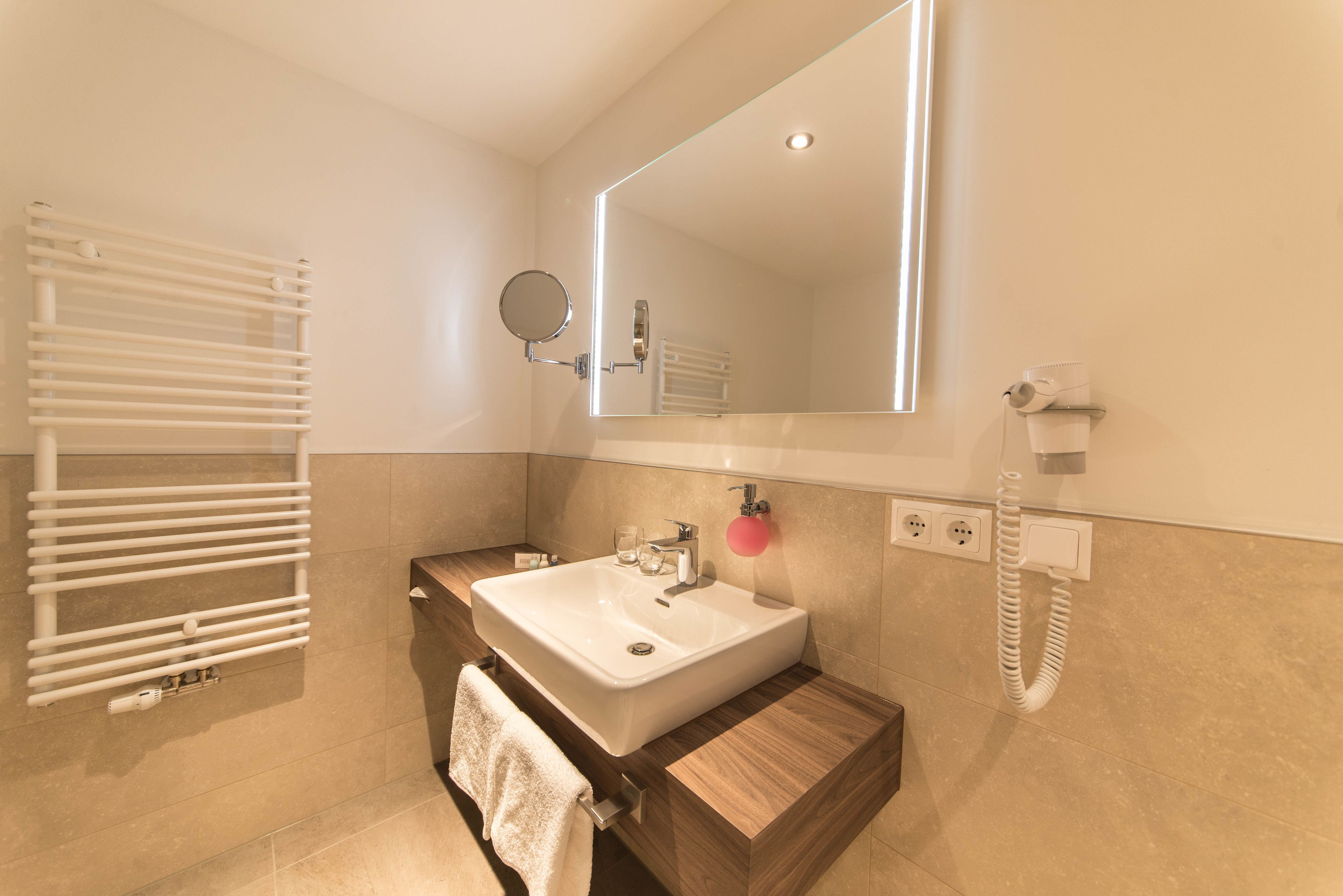 free toiletries, hair dryer, slippers, towels