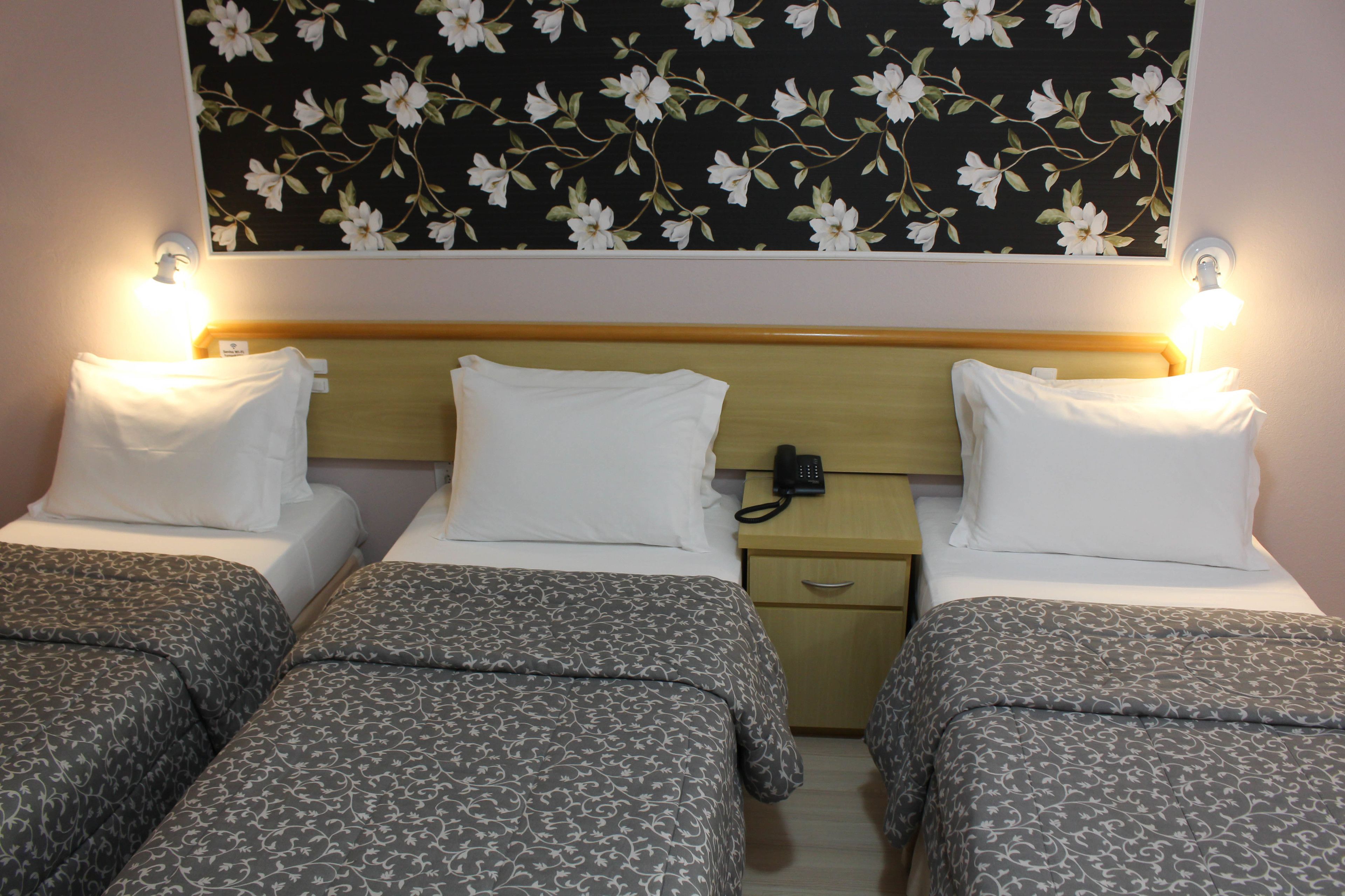 traditional triple room, 1 bedroom, non smoking | minibar, individually decorated, blackout curtains, rollaway beds