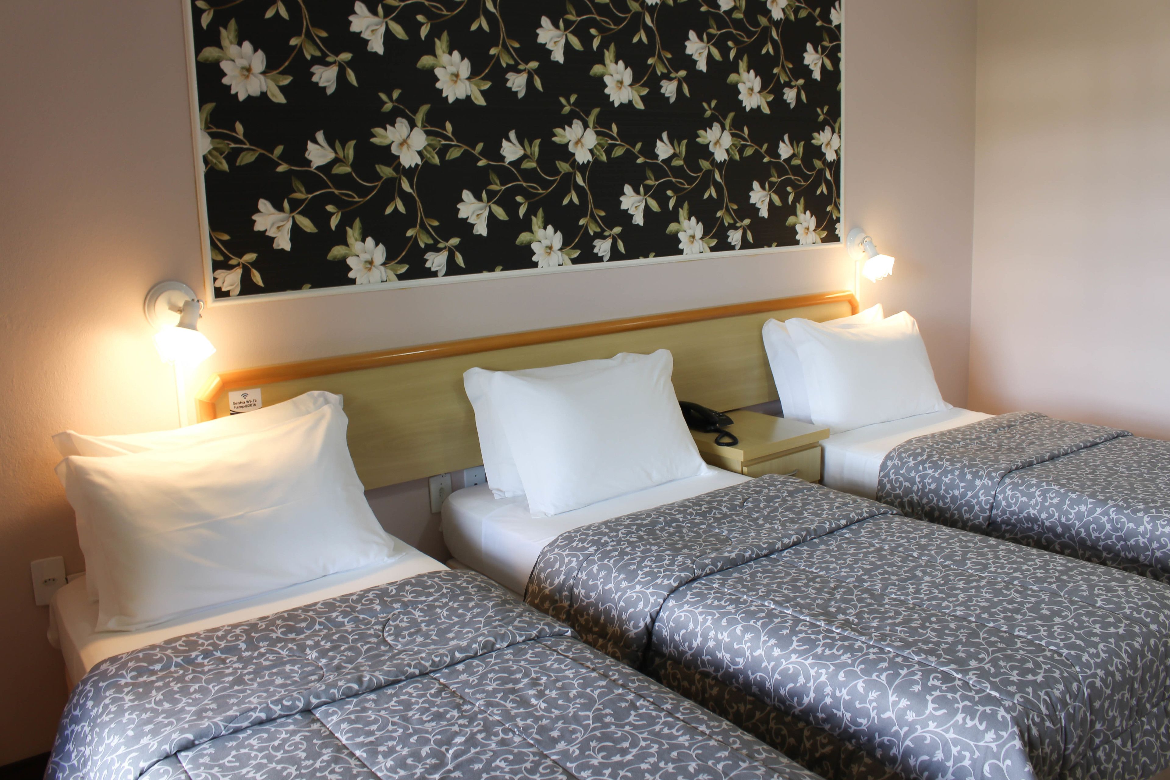 traditional triple room, 1 bedroom, non smoking | minibar, individually decorated, blackout curtains, rollaway beds