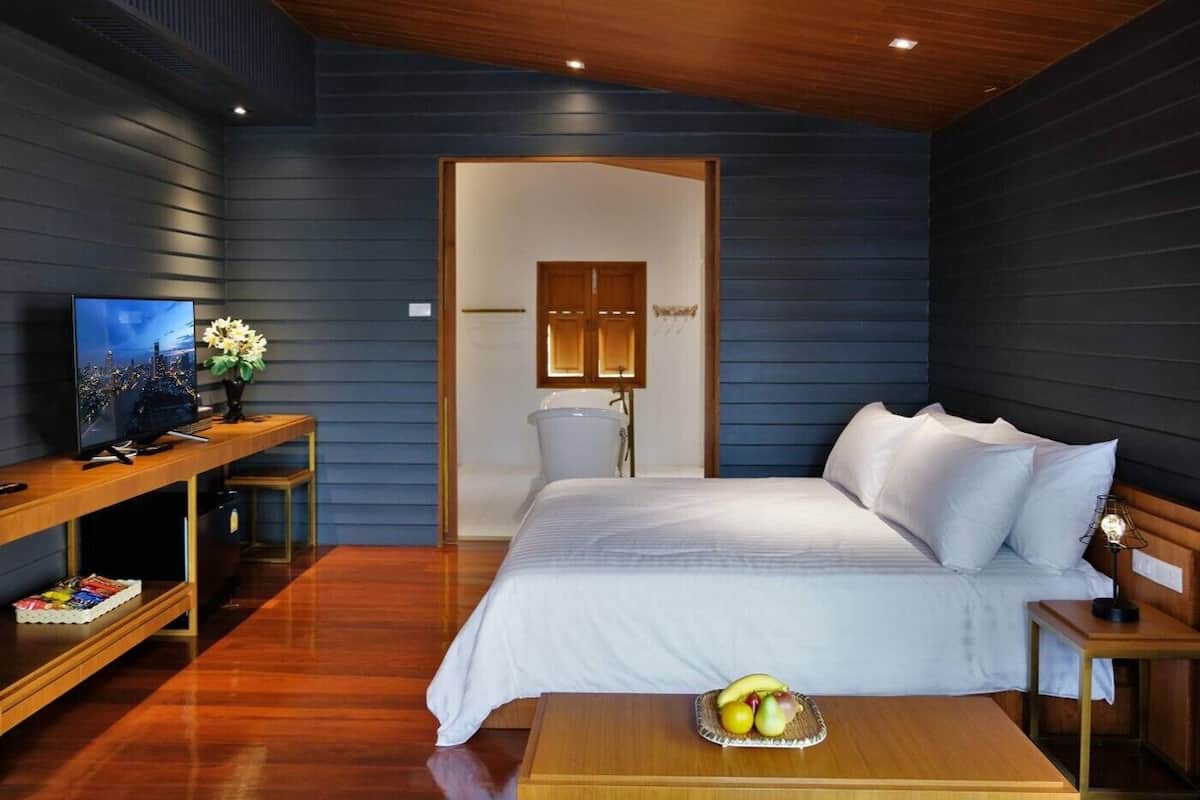 Junior Suite with Garden View | 1 slaapkamer, een minibar, verduisterende gordijnen, gratis wifi