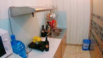 Microwave, electric kettle, cookware/dishes/utensils