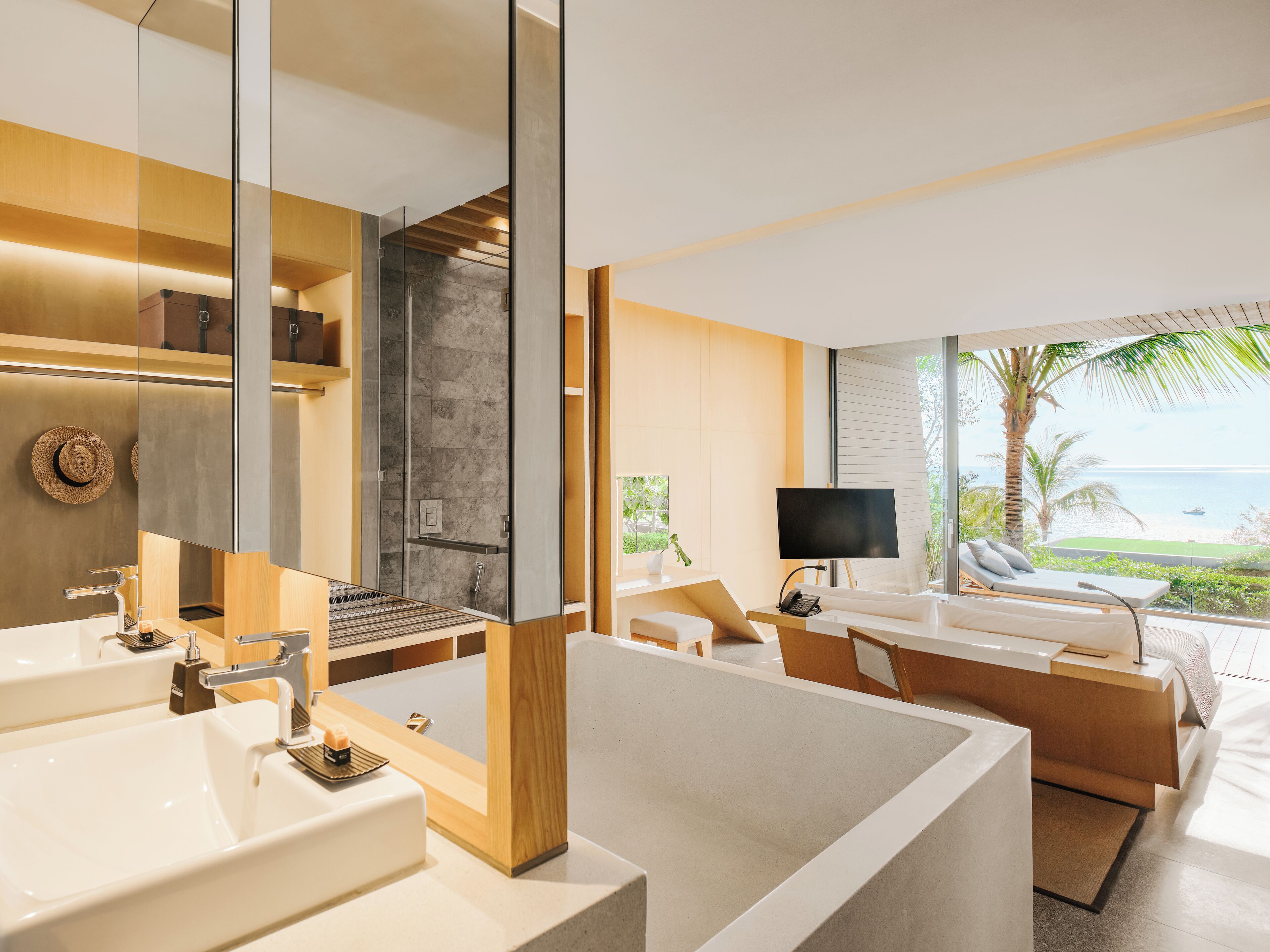 double grand pool villa | bathroom | separate bathtub and shower, rainfall showerhead, free toiletries