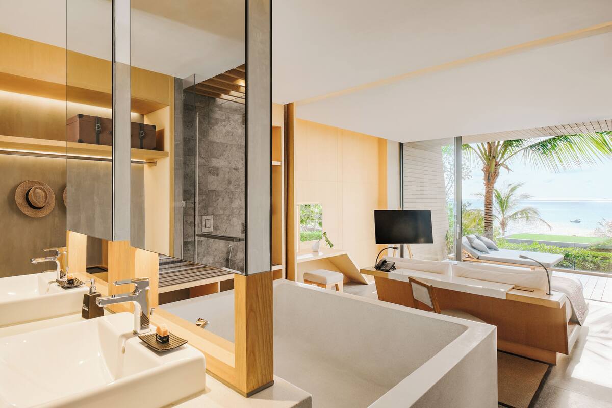 double grand pool villa | bathroom | separate bathtub and shower, rainfall showerhead, free toiletries