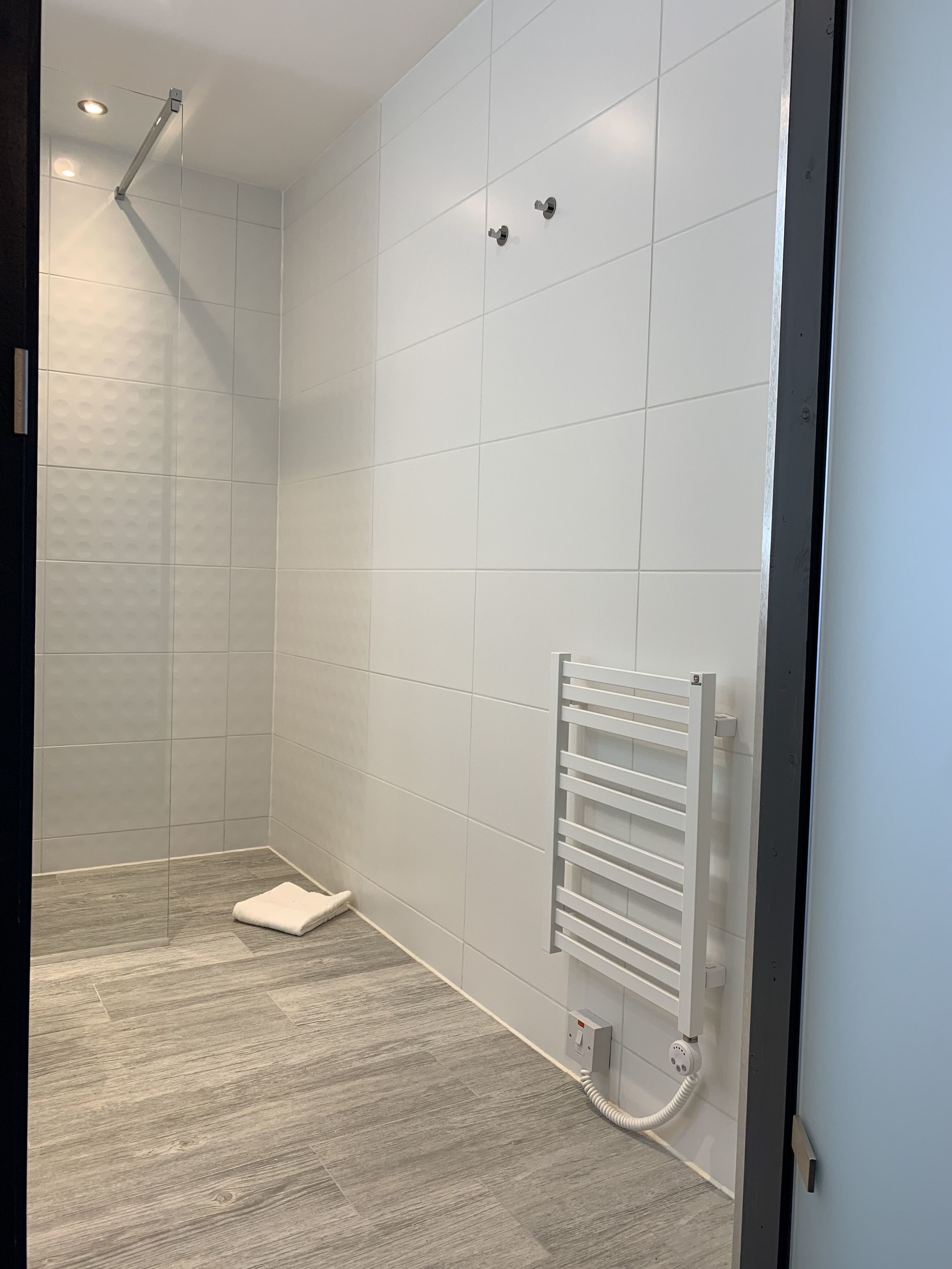 deluxe twin room | bathroom amenities | shower, rainfall showerhead, free toiletries, hair dryer