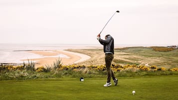 Golfers can enjoy a challenging round on this well-maintained course with ocean views.