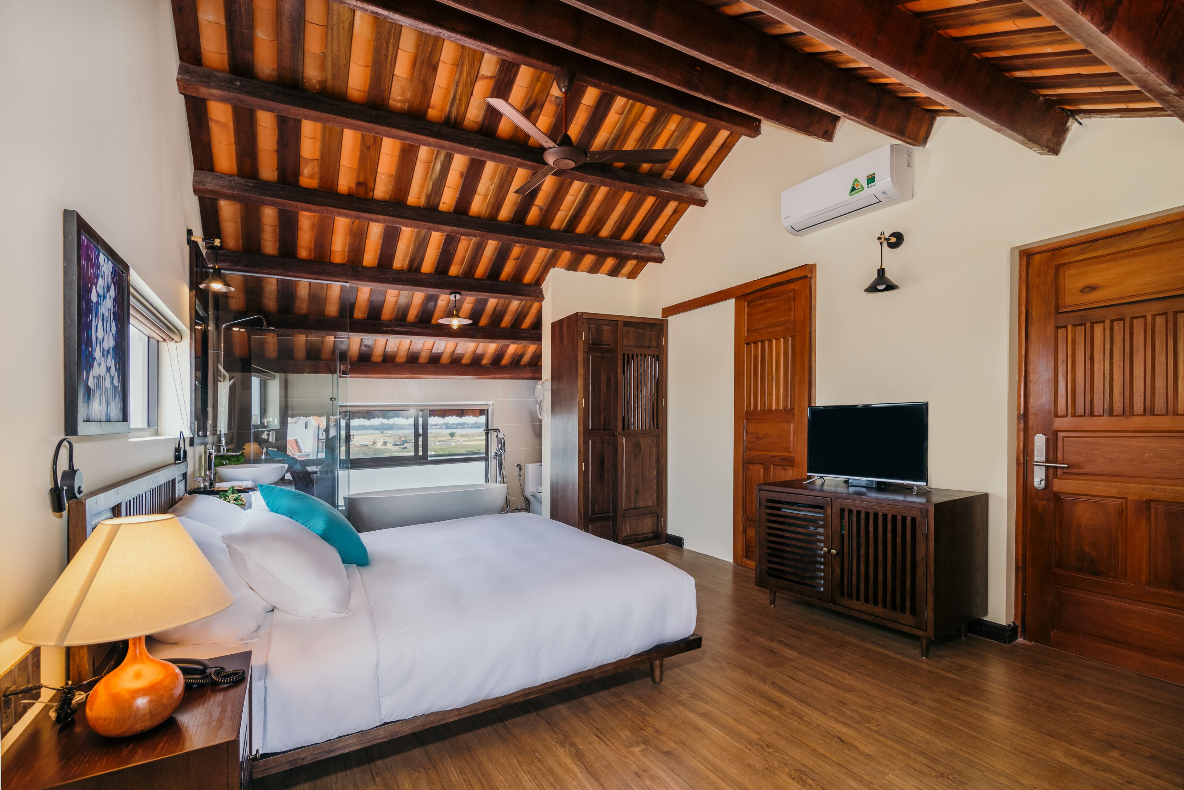 luxury suite, river view | minibar, in-room safe, desk, blackout curtains