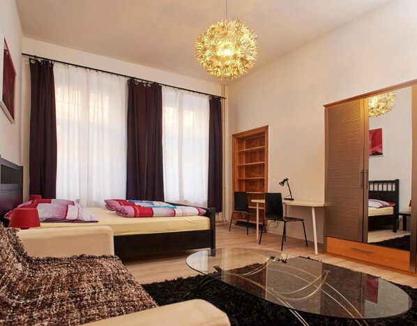 Blackout curtains, soundproofing, free WiFi, bed sheets