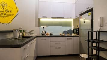 Fridge, microwave, electric kettle, cookware/dishes/utensils