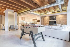 Apartment (3 Bedrooms) | Living room | TV, foosball - Spacious & Private 3 BDR Luxury Condo in Downtown (Chicago)