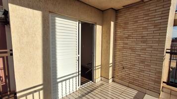 Suíte, várias camas (Master) | Vista da sacada