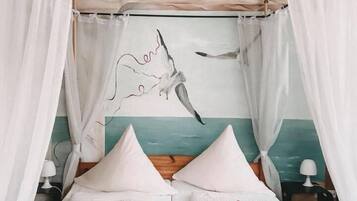 Desk, blackout drapes, iron/ironing board, cribs/infant beds