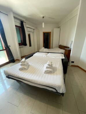 Apartment, 1 Bedroom (3) | 1 bedroom, in-room safe, desk, iron/ironing board - Flatinrome Fiera (Rome)