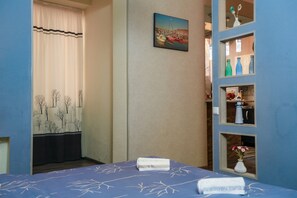 1 dormitorio, tabla de planchar con plancha, wifi