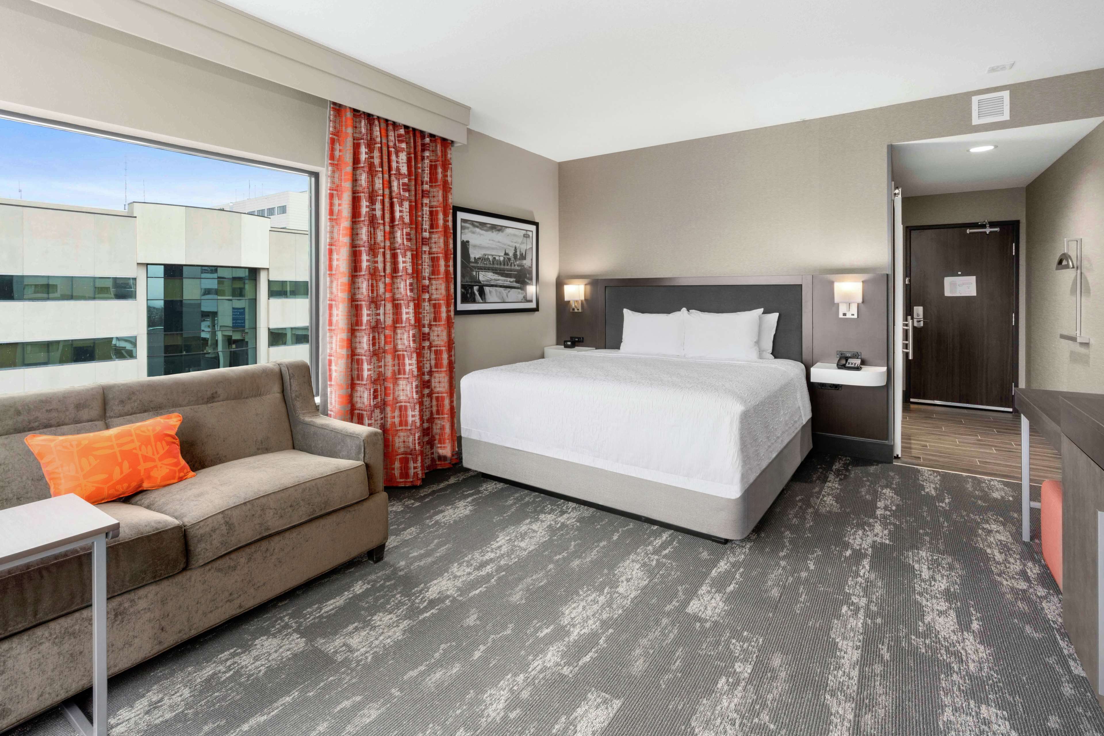 Room, 1 King Bed with Sofa bed, City View | Living area | Flat-screen TV