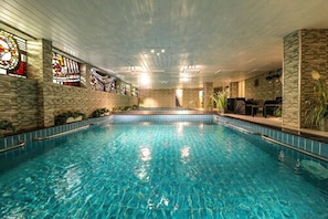 Indoor pool, open 7:00 AM to 9:00 PM, sun loungers