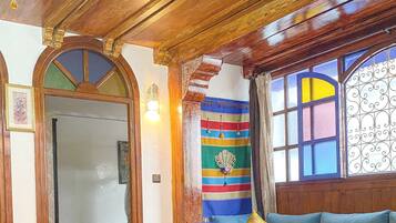 Apartment, 2 Bedrooms, Smoking, Ocean View | Living area | 32-inch flat-screen TV with satellite channels, TV