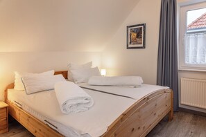 2 habitaciones, tabla de planchar con plancha y cuna de viaje 