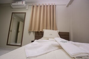 Habitación individual | Minibar, escritorio, wifi gratis y ropa de cama