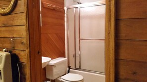 Combined shower/tub, toilet paper