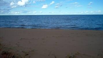 On the beach, sun loungers