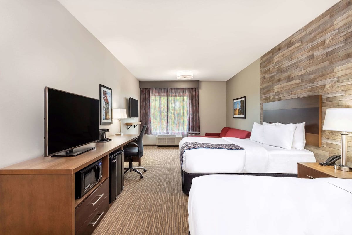 Premium bedding, down comforters, pillowtop beds, desk