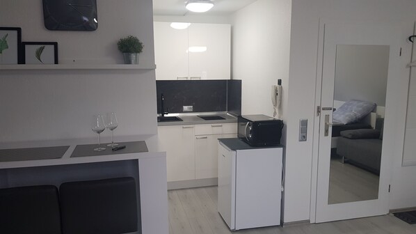 Apartamento, várias camas | Cozinha privada | Geladeira grande, micro-ondas, cooktop, máquina de café expresso