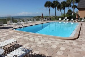 A heated pool, pool loungers