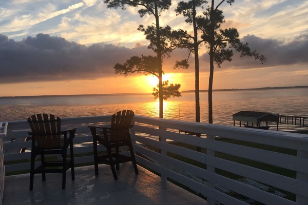 Sunrise from the crows nest upstairs off primary bedroom. The view is worth it!