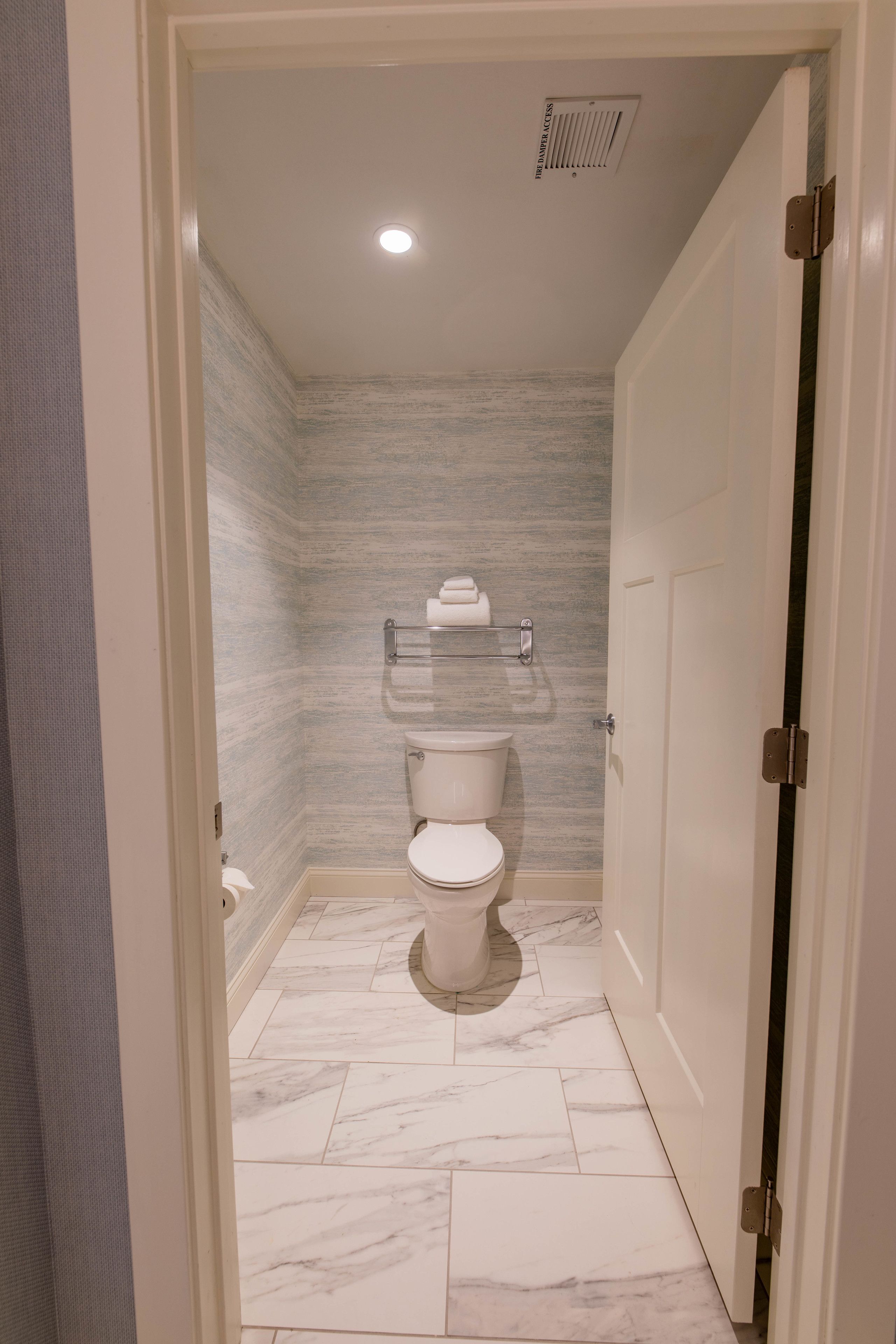 lavish bay suite | bathroom | shower, free toiletries, hair dryer, towels