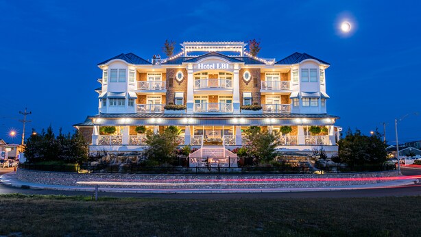 A large, multi-story hotel with a prominent sign reading "Hotel LBI". - Hotel LBI (Beach Haven)